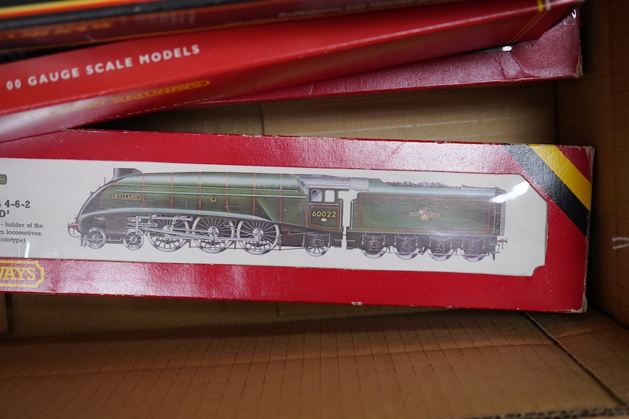 Six boxed 00 gauge railway locomotives by Hornby Railways, etc. including; a BR Class B17/4 (R.133), a BR Coronation Class, a BR Class A4 (R.350), an LNER Class B12/3 (R.150), a BR Class 9F (R.550) and a BR Patriot Class